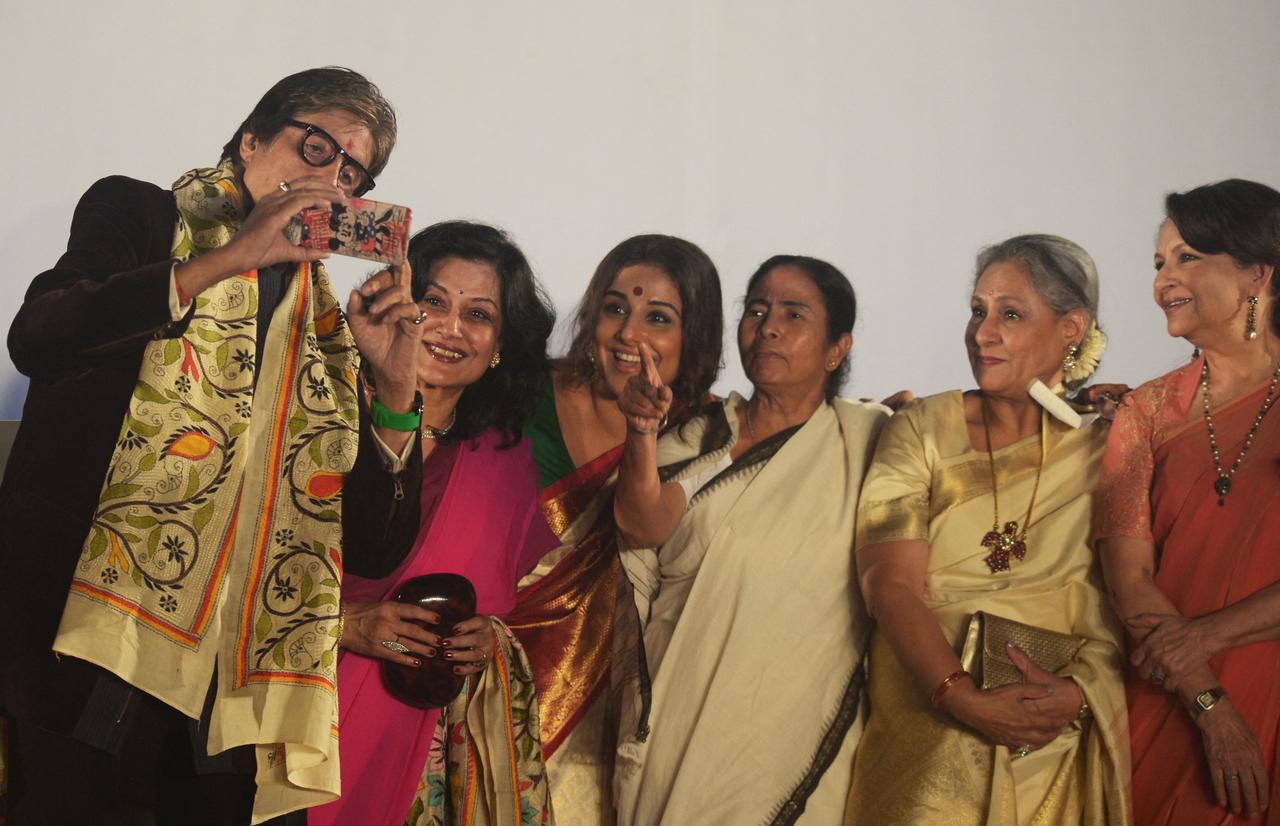 Amitabh Bachchan takes a selfie with the beautiful ladies Moushumi Chatterjee, Vidya Balan, Jaya Bachchan, Sharmila Tagore and the chief minister of eastern state of West Bengal Mamata Banerjee during the start of the 21st Kolkata International Film Festival in Kolkata in 2015